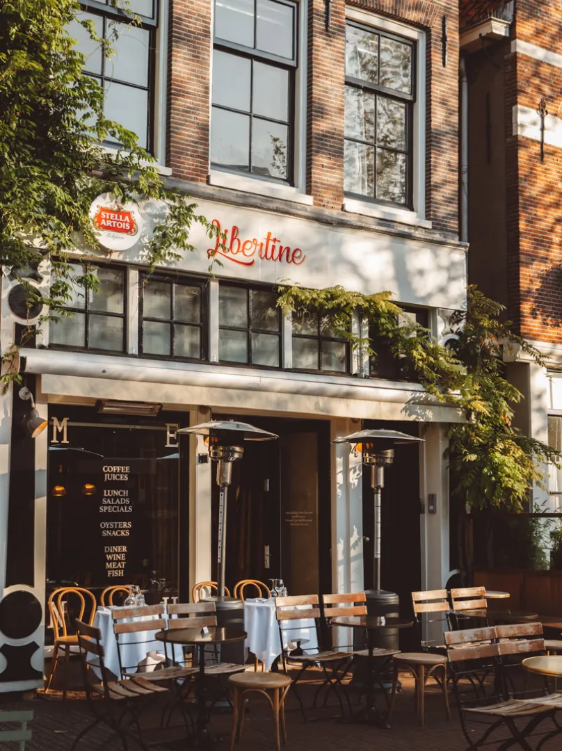 Libertine Petit Café — black and white photograph of the terrace at Noordermarkt 4, Amsterdam